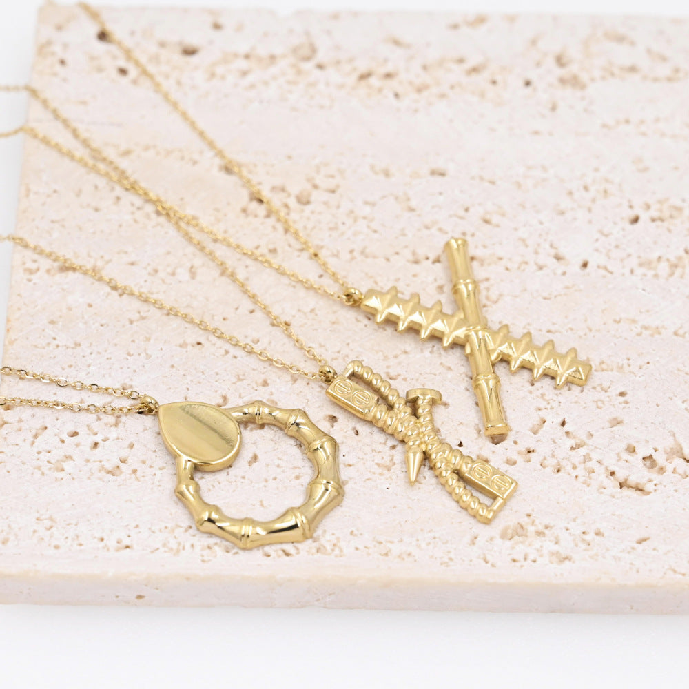 LEEDOUX Non-Fading Titanium Steel High-End X Letter Centipede Rivet Design Bamboo Knot Pendant Necklace